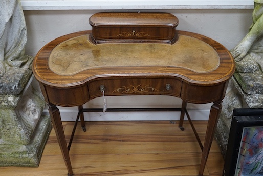 An Edwardian satinwood banded marquetry inlaid mahogany kidney shaped writing desk, width 89cm, depth 48cm, height 81cm
